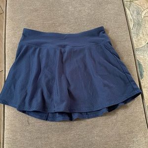 Super cute Dark blue Kyodan skort with zipper key pocket on back waistband sz M